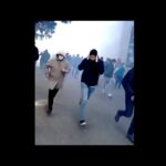 Oamenii fug de gaze lacrimogene la protestul din Ucraina