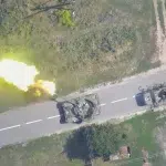 Explozie vehicul militar pe șosea aeriană