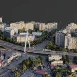 Oraș modern cu clădiri, străzi și pod luminat.